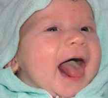 Beli prižigalnik v jeziku dojenčkov z dojenjem